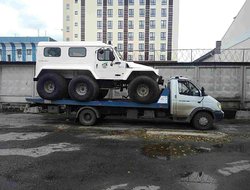 Фото процесса перевозки машины на эвакуаторе